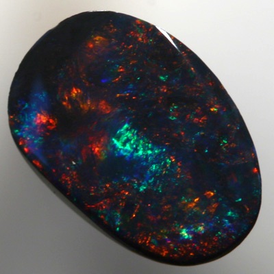 SOLID BLACK OPAL Very sparkly cherry red and green